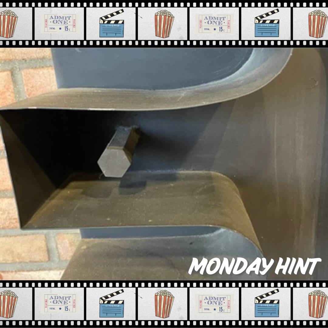 metal sculpture with curved lines